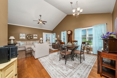 Embrace maintenance-free living in this beautiful end-unit