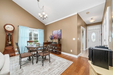 Embrace maintenance-free living in this beautiful end-unit