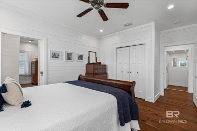 WATER FRONT LIVING DIRECTLY ON BON SECOUR RIVER! Custom built