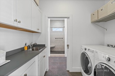 WATER FRONT LIVING DIRECTLY ON BON SECOUR RIVER! Custom built