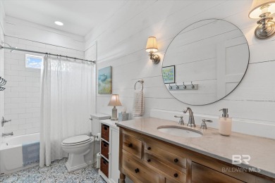 WATER FRONT LIVING DIRECTLY ON BON SECOUR RIVER! Custom built