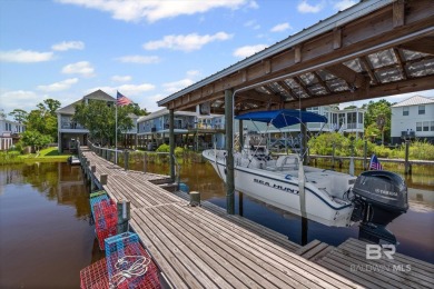 WATER FRONT LIVING DIRECTLY ON BON SECOUR RIVER! Custom built