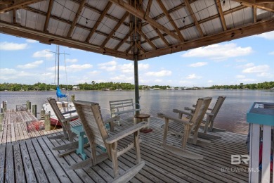 WATER FRONT LIVING DIRECTLY ON BON SECOUR RIVER! Custom built
