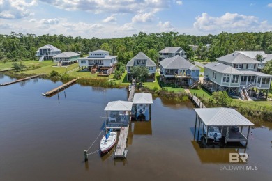 WATER FRONT LIVING DIRECTLY ON BON SECOUR RIVER! Custom built