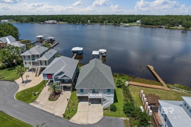 WATER FRONT LIVING DIRECTLY ON BON SECOUR RIVER! Custom built