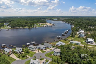 WATER FRONT LIVING DIRECTLY ON BON SECOUR RIVER! Custom built