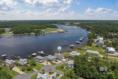 WATER FRONT LIVING DIRECTLY ON BON SECOUR RIVER! Custom built