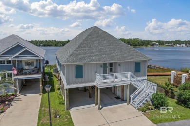 WATER FRONT LIVING DIRECTLY ON BON SECOUR RIVER! Custom built