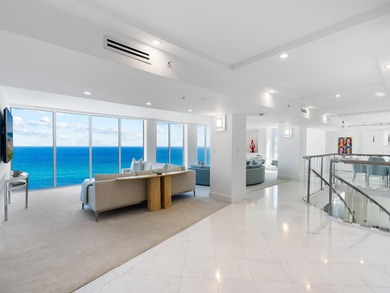 This is truly a special, oceanfront, SE, rooftop Penthouse