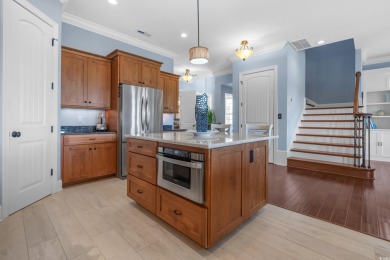 Discover coastal elegance in this exceptional home nestled along