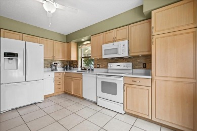 Experience tranquil waterfront living with elevated views in the