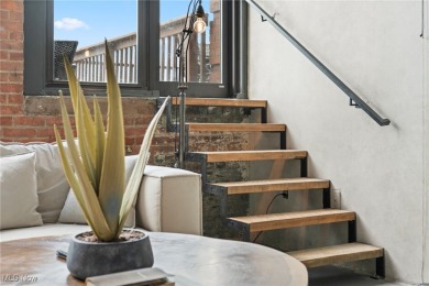 Welcome to 1133 W 9th St #315, a stylish and modern 1-bedroom