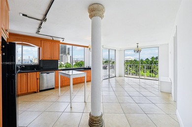 Welcome to this exceptional 2-bedroom, 2-bath condo perched on
