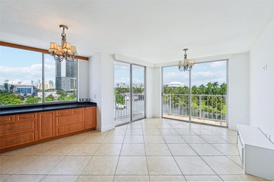 Welcome to this exceptional 2-bedroom, 2-bath condo perched on