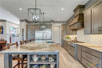 Nestled on a sprawling 1.6-acre lot, this stunning custom home