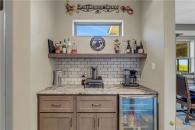 Nestled on a sprawling 1.6-acre lot, this stunning custom home