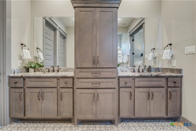 Nestled on a sprawling 1.6-acre lot, this stunning custom home