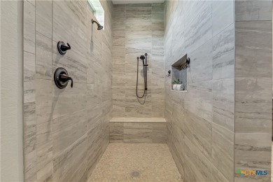 Nestled on a sprawling 1.6-acre lot, this stunning custom home