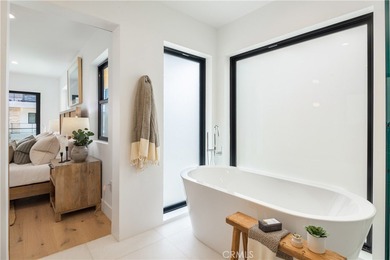 Brand New Construction. Coastal modern townhome offering 4