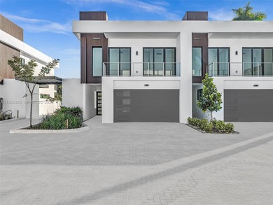 Introducing H2O Dania, a newly delivered, gated townhome