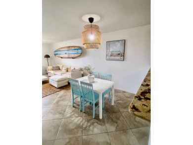 Don't miss This beautifully updated 2/2 penthouse condo