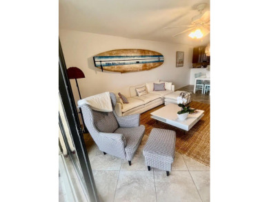 Don't miss This beautifully updated 2/2 penthouse condo