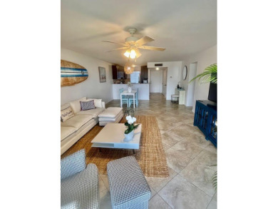 Don't miss This beautifully updated 2/2 penthouse condo