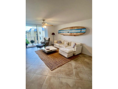 Don't miss This beautifully updated 2/2 penthouse condo