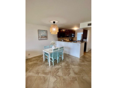 Don't miss This beautifully updated 2/2 penthouse condo