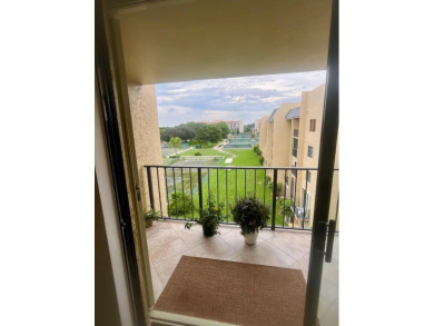 Don't miss This beautifully updated 2/2 penthouse condo