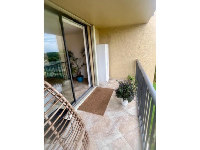 Don't miss This beautifully updated 2/2 penthouse condo