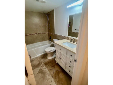 Don't miss This beautifully updated 2/2 penthouse condo