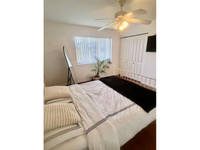 Don't miss This beautifully updated 2/2 penthouse condo