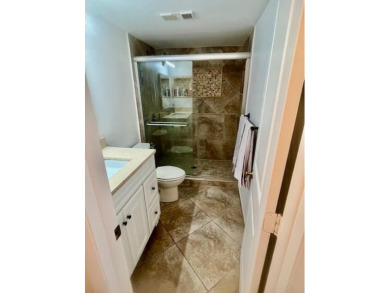 Don't miss This beautifully updated 2/2 penthouse condo