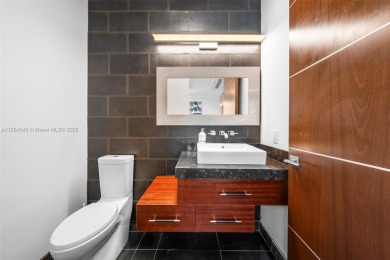 Discover luxury in this custom modern home on a premier Las Olas