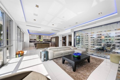 Discover luxury in this custom modern home on a premier Las Olas