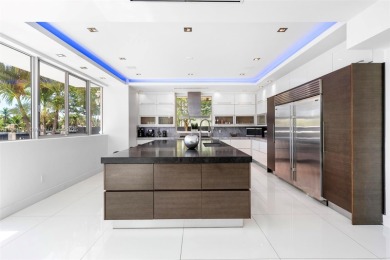 Discover luxury in this custom modern home on a premier Las Olas