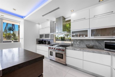 Discover luxury in this custom modern home on a premier Las Olas