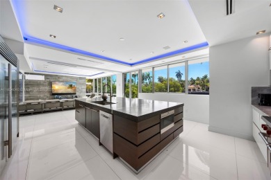 Discover luxury in this custom modern home on a premier Las Olas