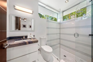 Discover luxury in this custom modern home on a premier Las Olas