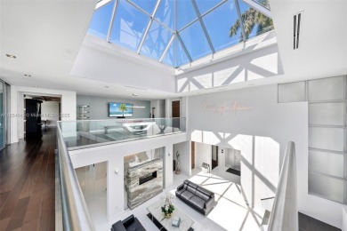 Discover luxury in this custom modern home on a premier Las Olas