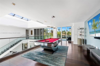 Discover luxury in this custom modern home on a premier Las Olas