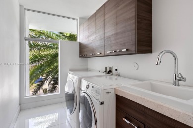 Discover luxury in this custom modern home on a premier Las Olas