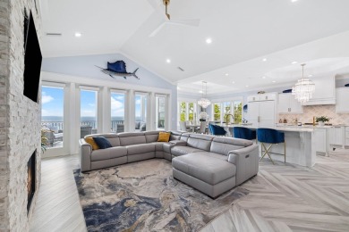 Premier, one of a kind bayfront home with prime boating access