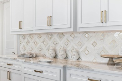 Premier, one of a kind bayfront home with prime boating access