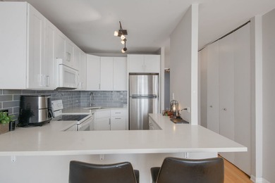 Enjoy full amenity living in this bright and spacious Junior one