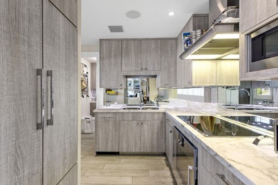 Completely renovated and spacious 2BR/2.5BA corner unit in the