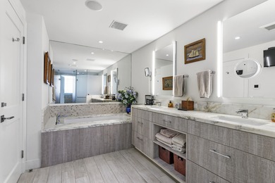 Completely renovated and spacious 2BR/2.5BA corner unit in the