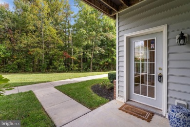 Includes a separately deeded BOAT SLIP  Welcome home to this