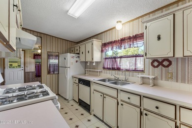 Discover your peaceful waterfront retreat on a quiet canal with